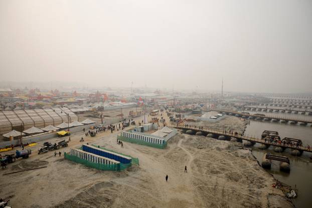 Hindu devotees arrive to attend the "Maha Kumbh Mela", or the Pitcher Festival, in Prayagraj