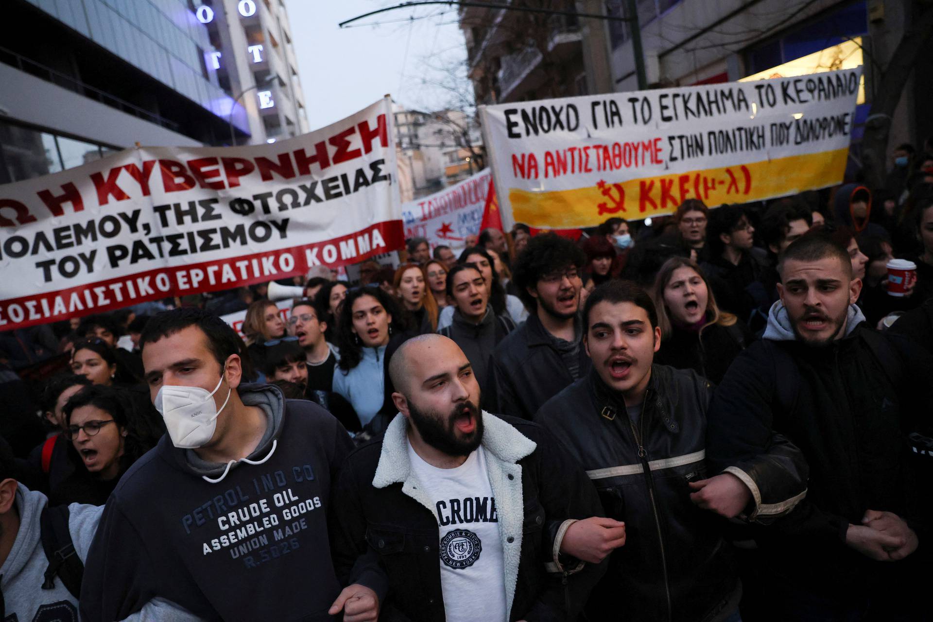 Protesters take part in a demonstration after a train crash near the city of Larissa, in Athens