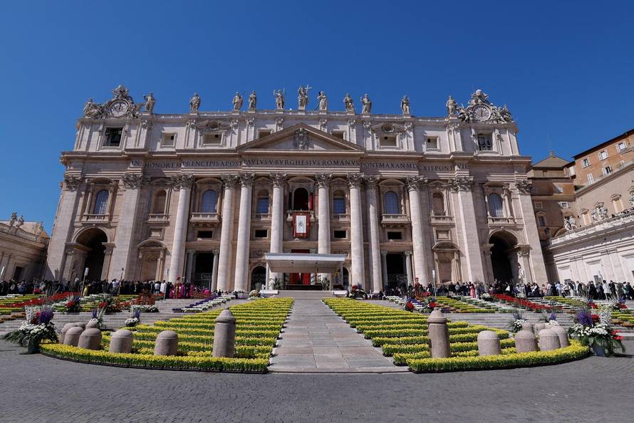 Pope Leo XIV delivers his "Urbi et Orbi" (To the city and the world) message from the main balcony of St. Peter's Basilica