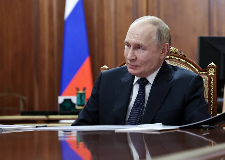 Russian President Putin meets Governor of Murmansk region Chibis in Moscow