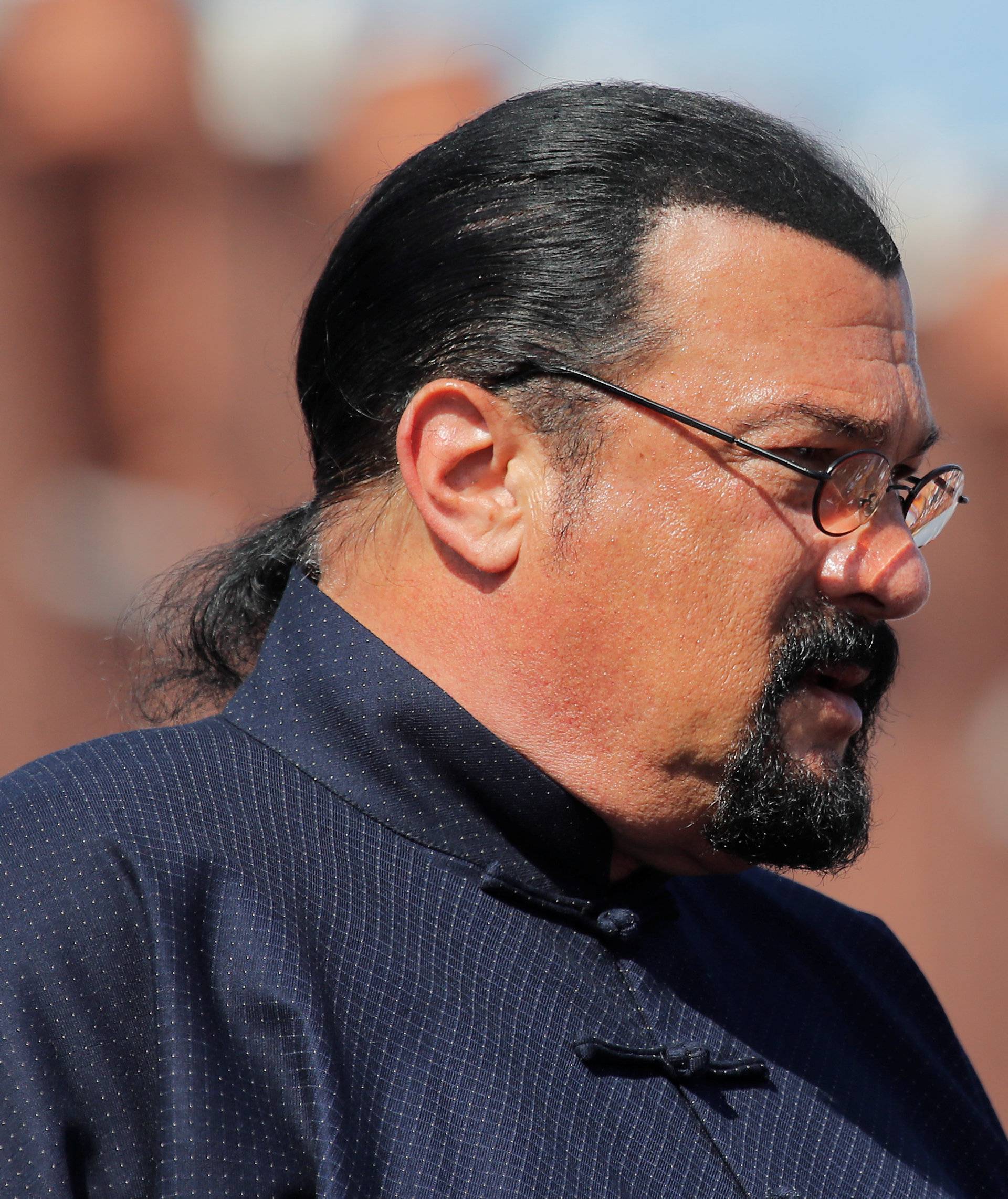 U.S. actor Steven Seagal watches the Victory Day parade at Red Square in Moscow