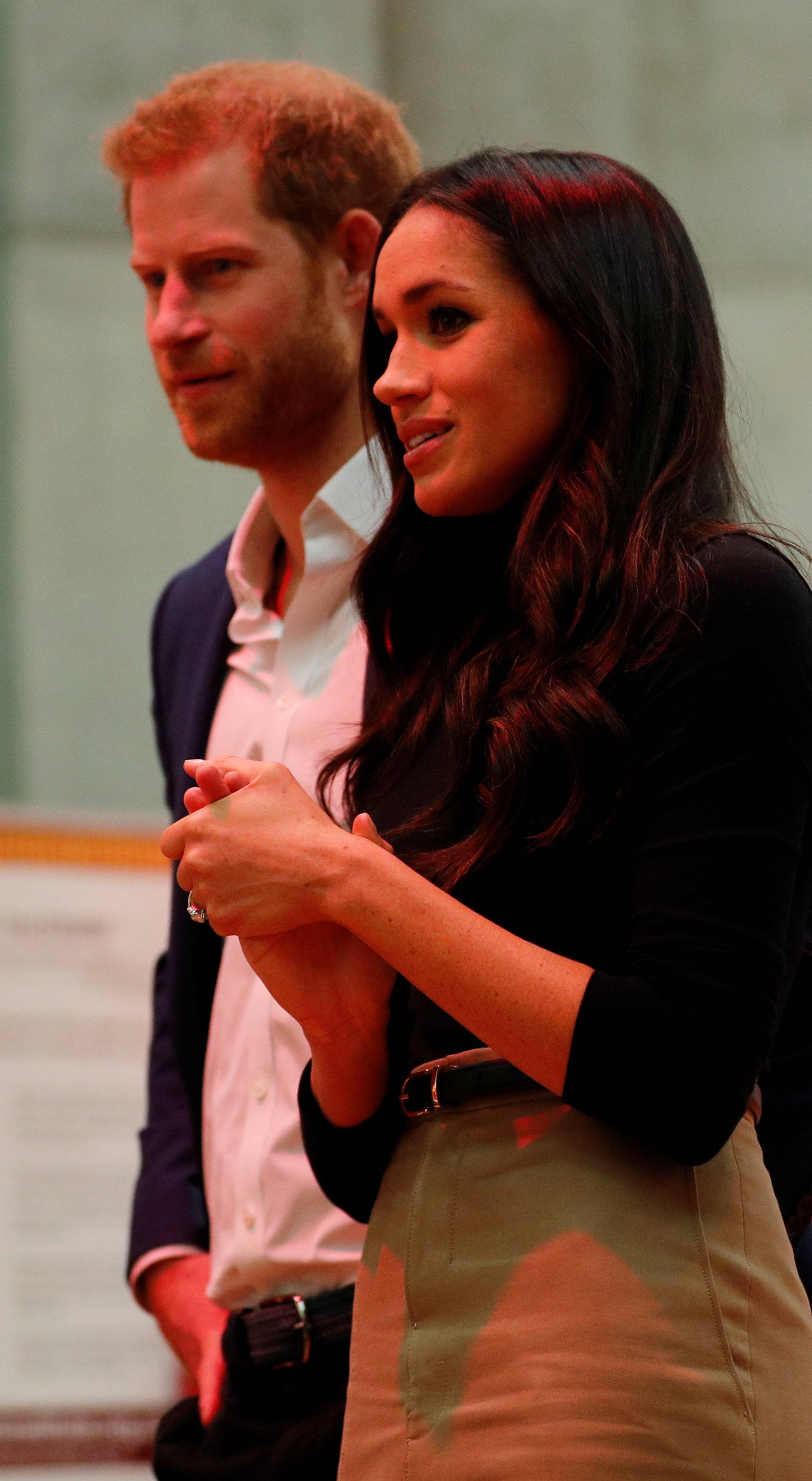 Britain's Prince Harry and his fiancee Meghan Markle visit the Terrence Higgins Trust World AIDS Day charity fair at Nottingham Contemporary in Nottingham