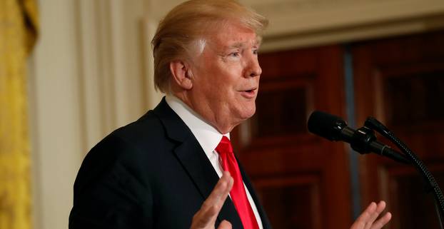 U.S. President Donald Trump holds a joint news conference with Swedish Prime Minister Stefan Lofven in the White House East Room in Washington