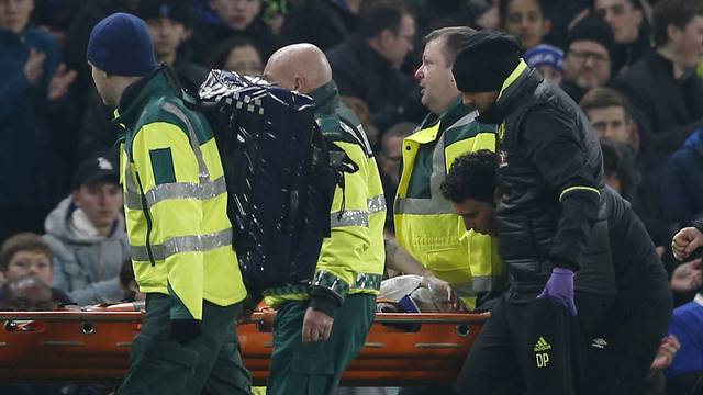 Hull City's Ryan Mason is stretchered off injured