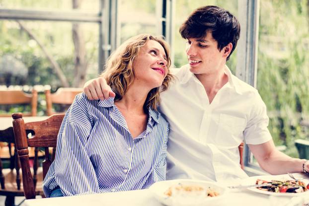 Couple dating in the cafe