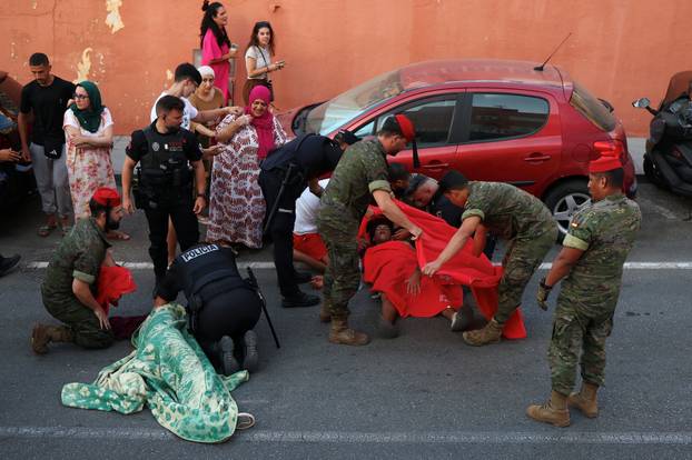 Mass crossings of migrants on foot and by sea from Morocco into Spanish territory, in Ceuta