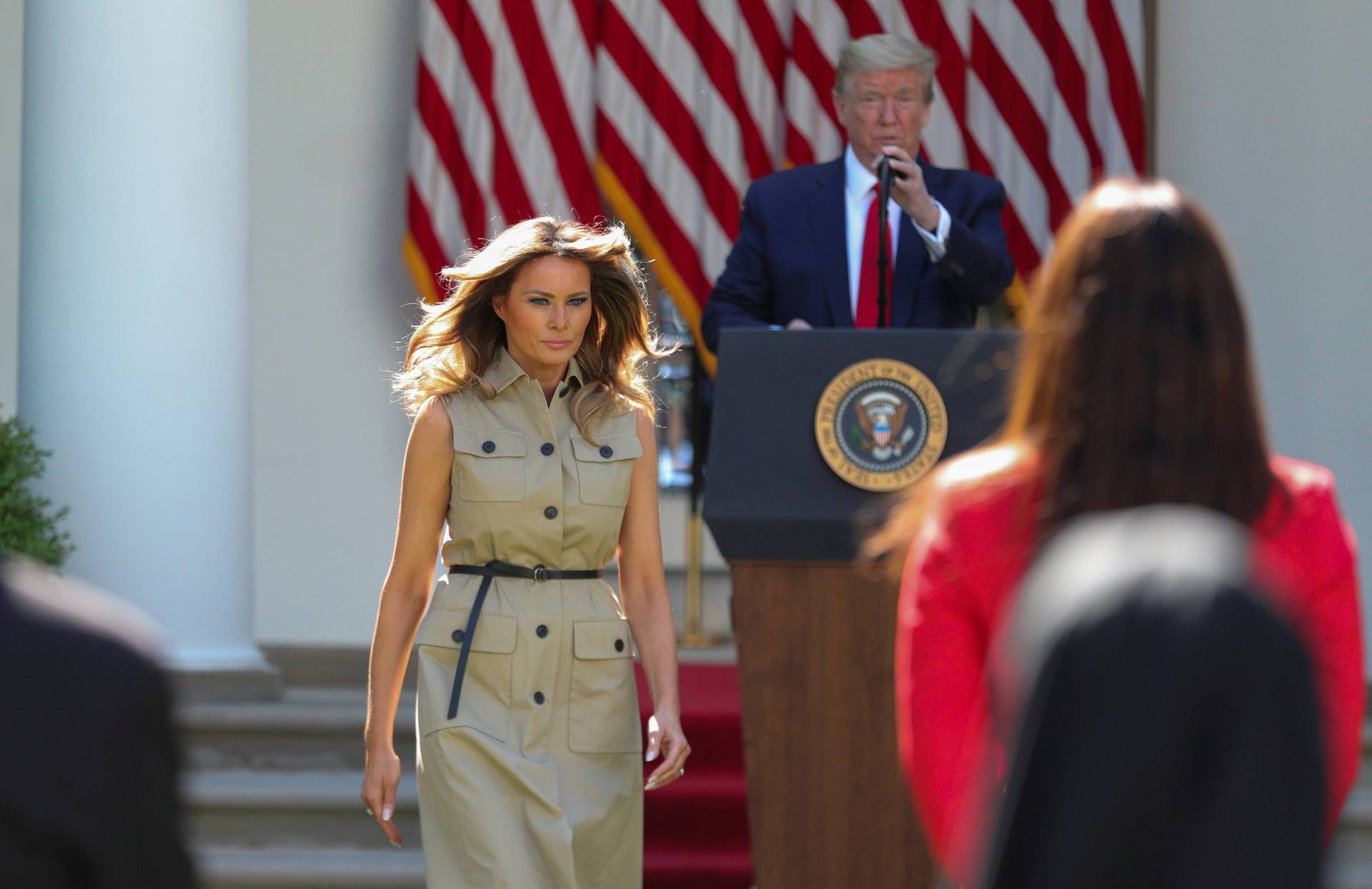 First lady Melania Trump and U.S. President Trump arrive at White House National Day of Prayer Service in the Rose Garden at the White House in Washington