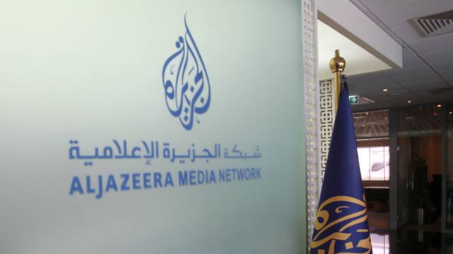 Al Jazeera logo seen inside HQ in Doha