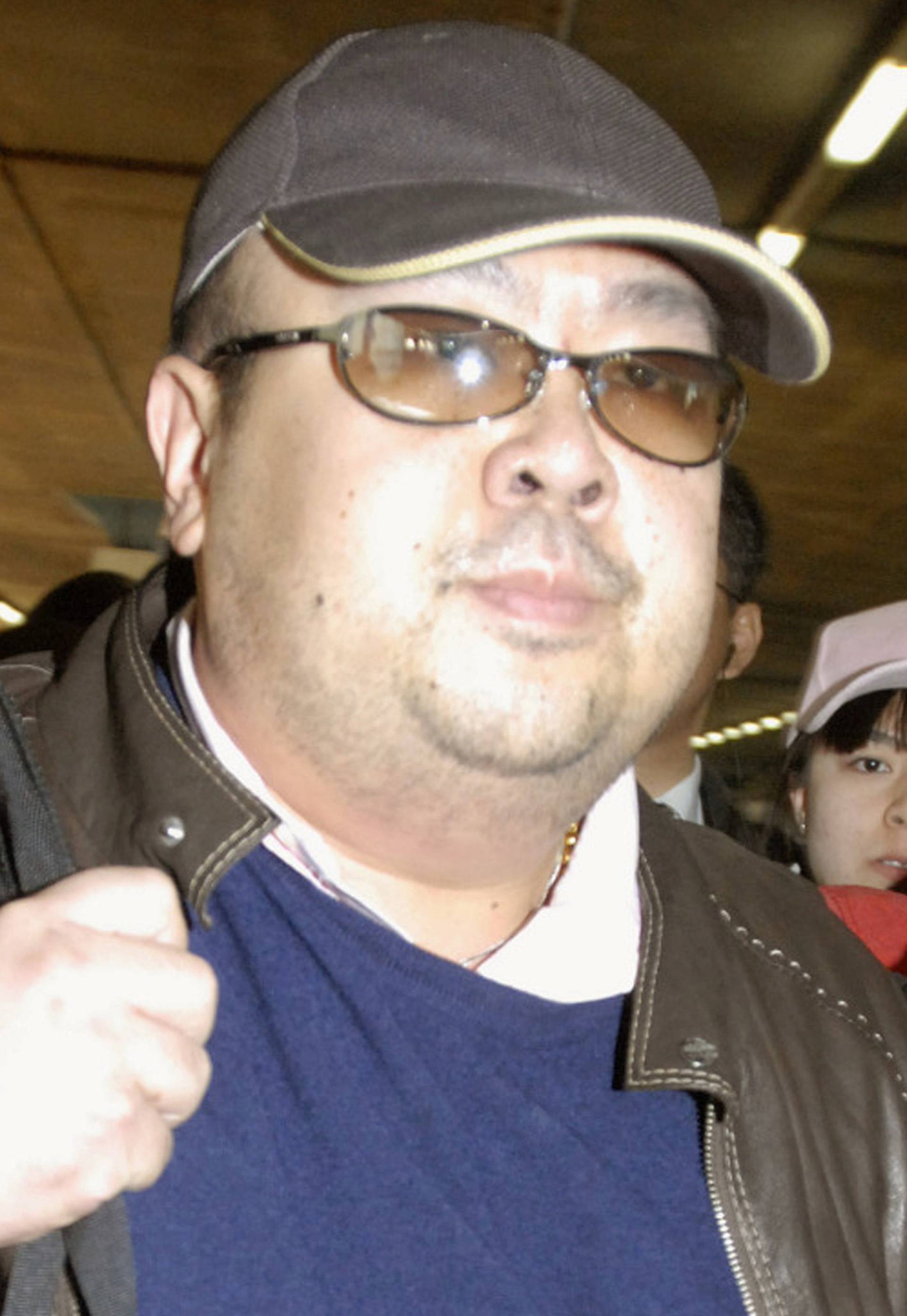 Kim Jong Nam arrives at Beijing airport in Beijing, China, in this photo taken by Kyodo