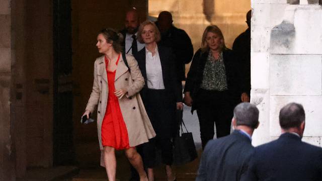British Prime Minister Liz Truss walks inside the Houses of Parliament estate in London
