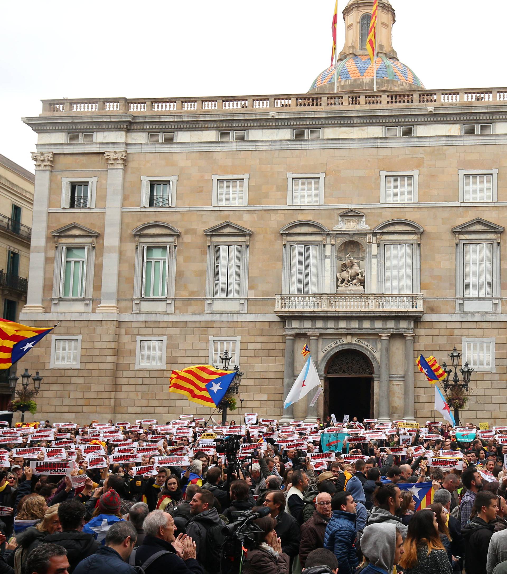 Protesters gather in Sant Jaume square at a demonstration during a partial regional strike in Barcelona