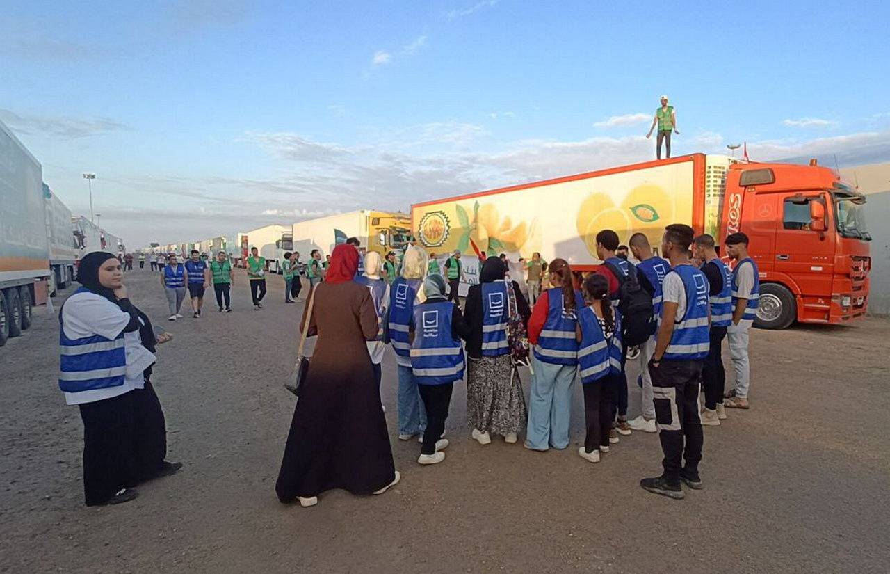 Groups carrying humanitarian aid for Palestinians wait for Rafah crossing to open