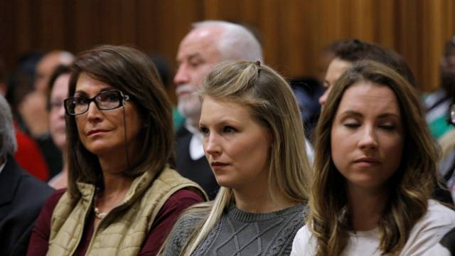 Former girlfriend Jenna Edkins looks on as former Paralympian Oscar Pistorius appears for sentencing for the murder of Reeva Steenkamp at the Pretoria High Court