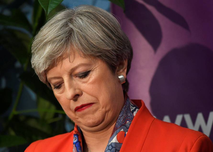 Britain's Prime Minister Theresa May waits for the result of the vote in her constituency at the count centre for the general election in Maidenhead,