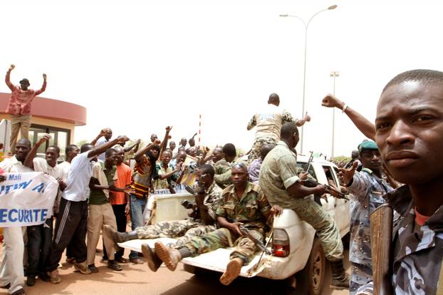 FILE PHOTO: Supporters of Mali