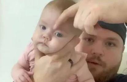 Umorni tata pokazao genijalan trik kako bebu uspavati u trenu