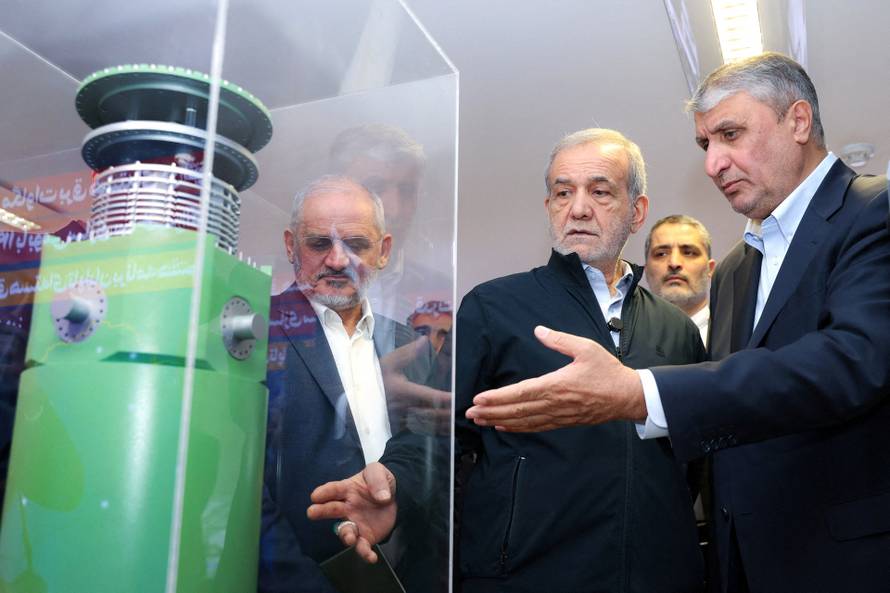 FILE PHOTO: Iran's President Masoud Pezeshkian visits Iran's nuclear achievements exhibition in Tehran