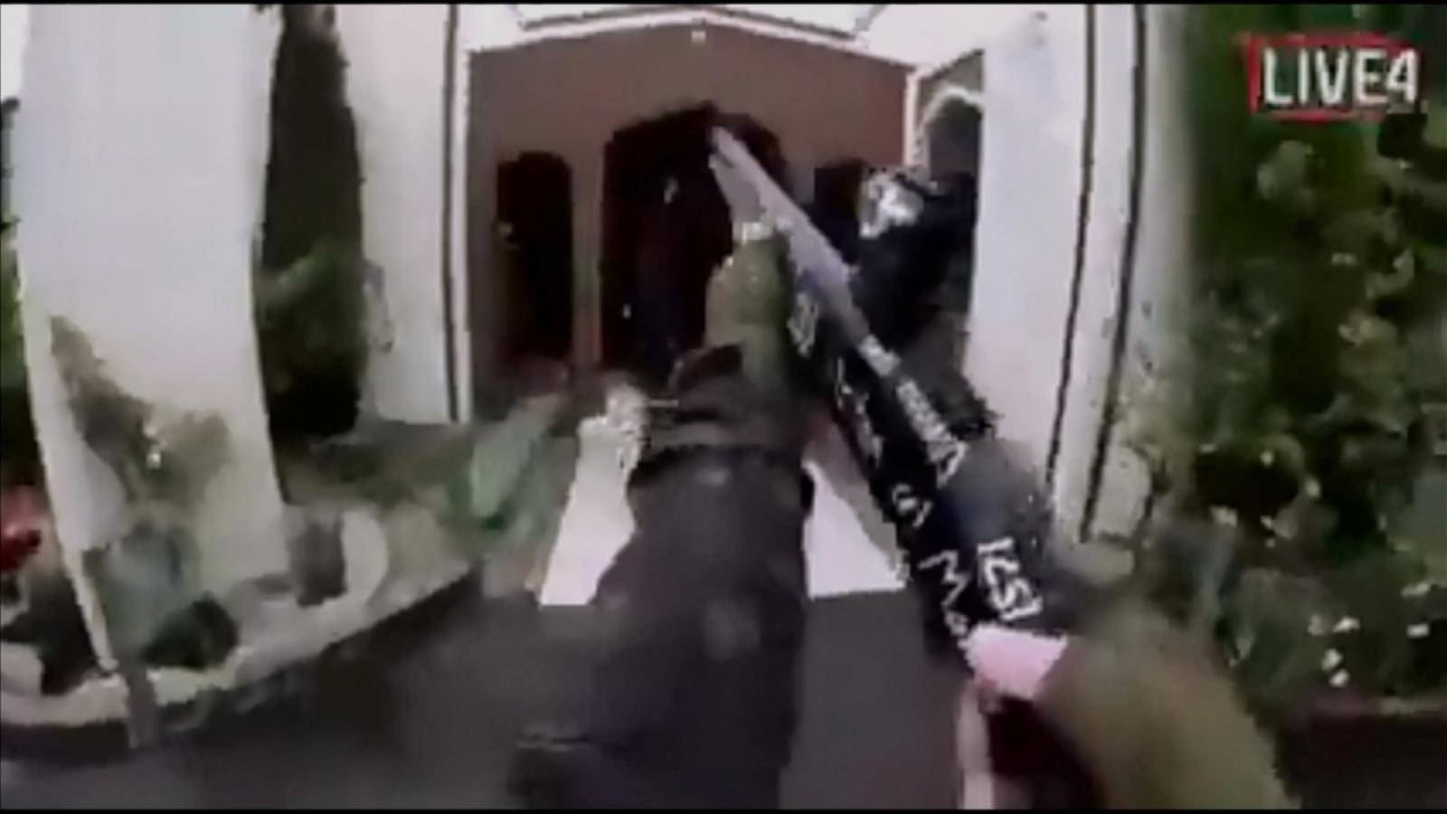 A still image taken from video circulated on social media, apparently taken by a gunman and posted online live as the attack unfolded, shows him entering a mosque in Christchurch