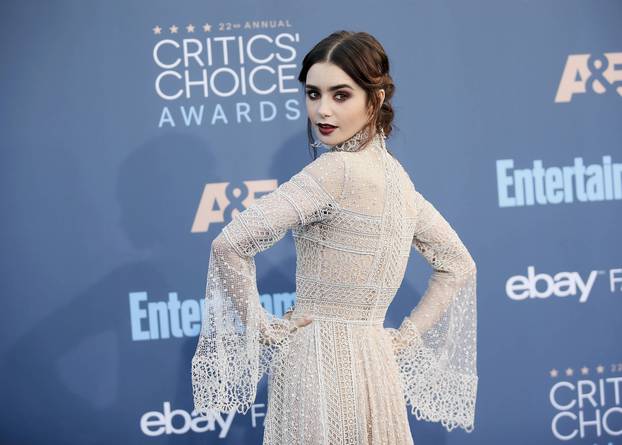Lily Collins arrives at the 22nd Annual Critics