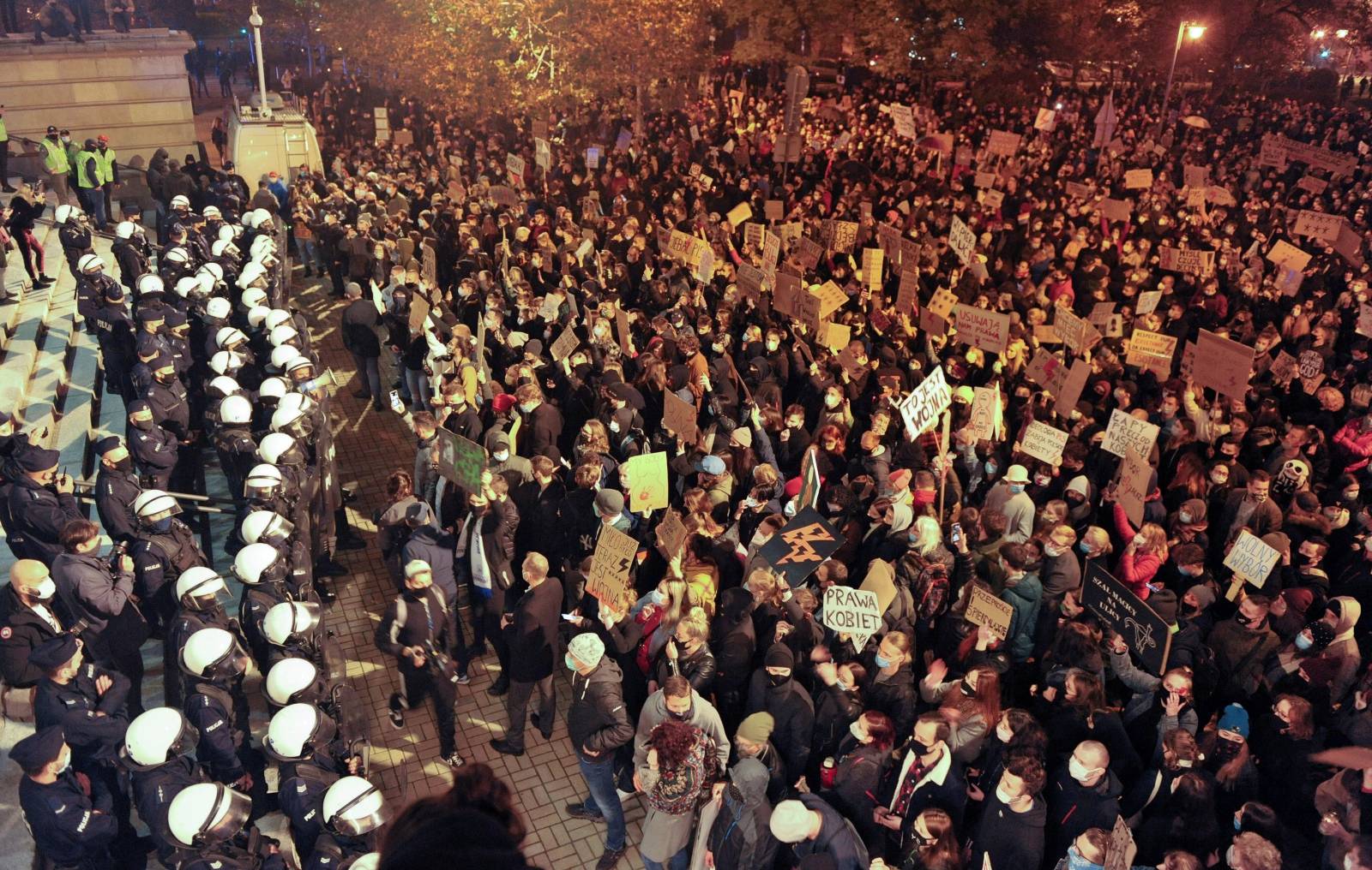 FILE PHOTO: People protest against imposing further restrictions on abortion law in front of the Catholic Cathedral in Katowice