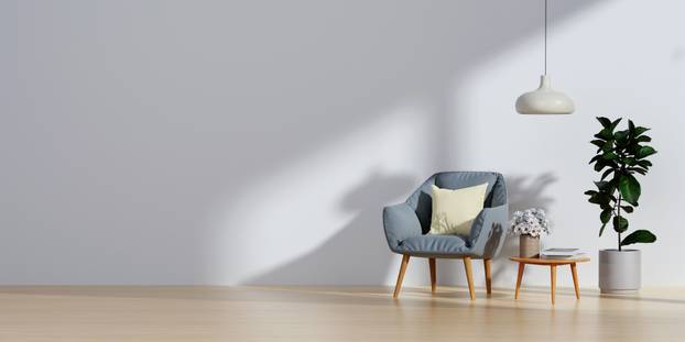Living room with blue fabric armchair on empty white wall background.3d rendering