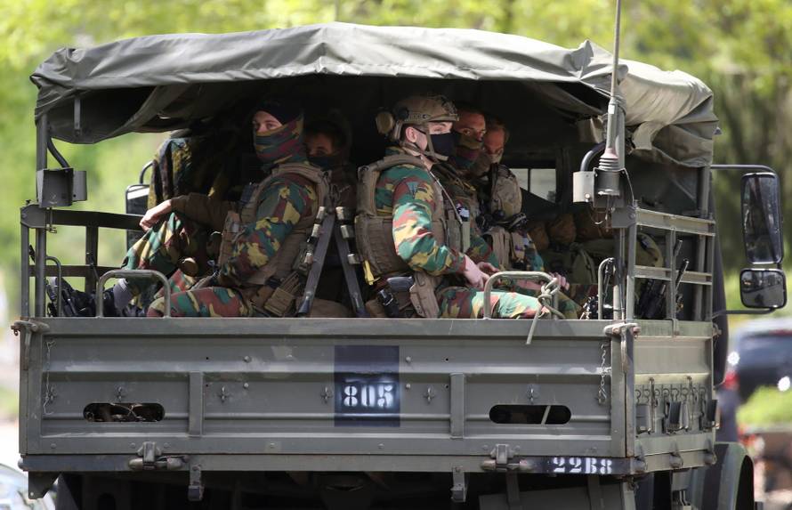 Manhunt for a Belgian soldier who threatened a virologist, in Maasmechelen