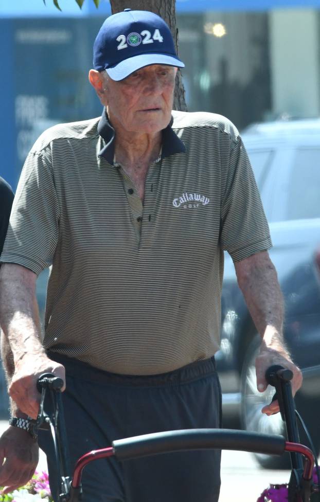 EXCLUSIVE: George Lazenby Looking Frail While Out And About In Santa Monica, Ca With Some Family Members - 16 Aug 2024