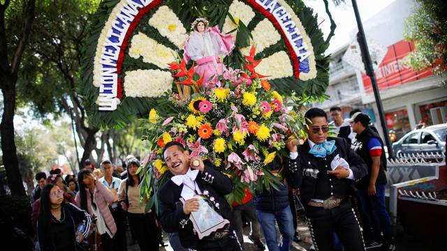 Mariachis march to the Basilica of Our Lady of Guadalupe in Mexico City