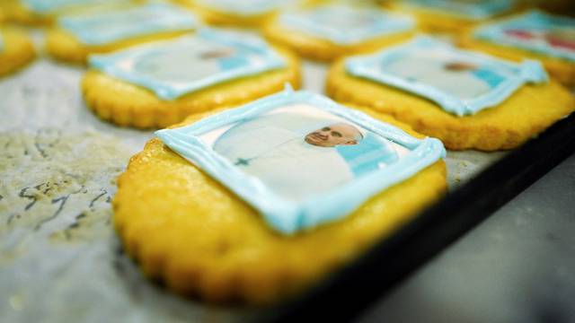 Cookies with Pope Francis images are seen in a bakery ahead of his apostolic journey to Portugal, in Lisbon