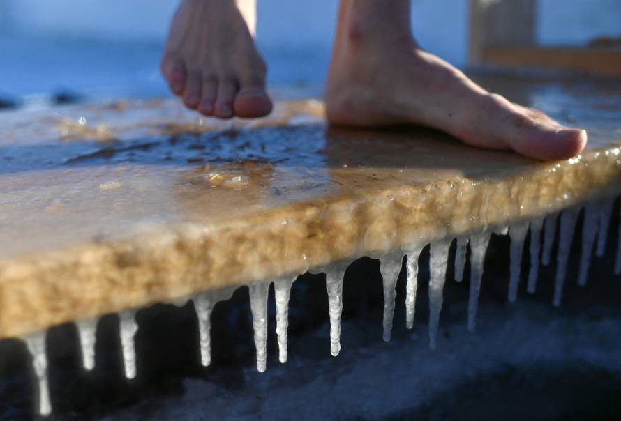 People celebrate the Orthodox Christian feast of Epiphany in Omsk