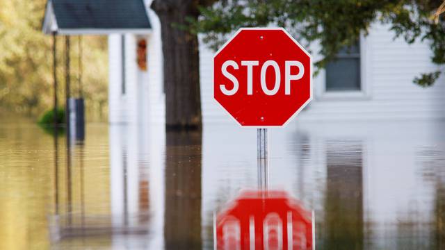 A neighborhood is submerged in flood waters from the swollen Tar River in the aftermath of Hurricane Matthew, in Tarboro, North Carolina