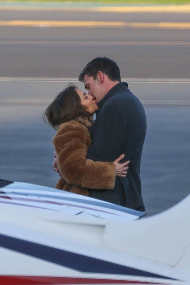 *EXCLUSIVE* Ben Affleck and Jennifer Lopez pack on the PDA as her pilot waits ahead of a flight out of LA