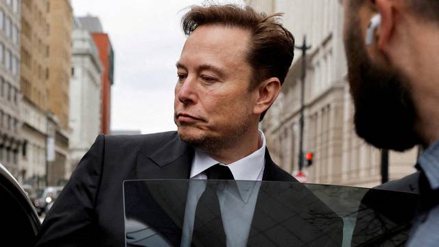 FILE PHOTO: Tesla CEO Musk departs the company’s local office in Washington