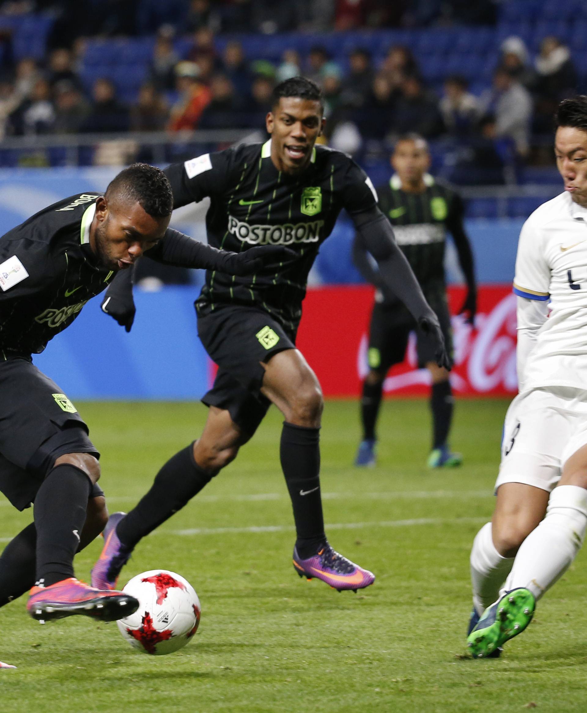 Atletico Nacional's Miguel Borja in action with Kashima Antlers' Gen Shoji