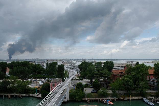 Large clouds of black smoke billows from chemical plant in Marghera near Venice after an explosion