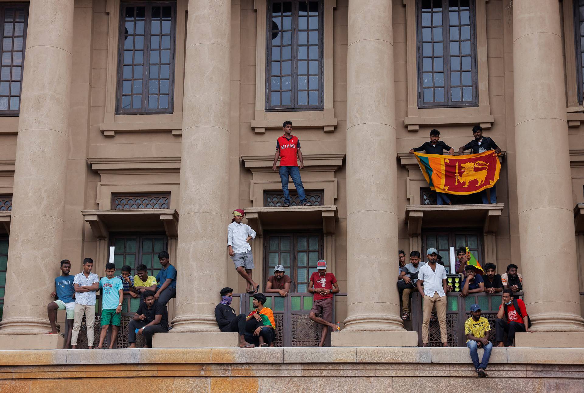 Demonstrators protest at the Presidential Secretariat, after President Gotabaya Rajapaksa fled, in Colombo