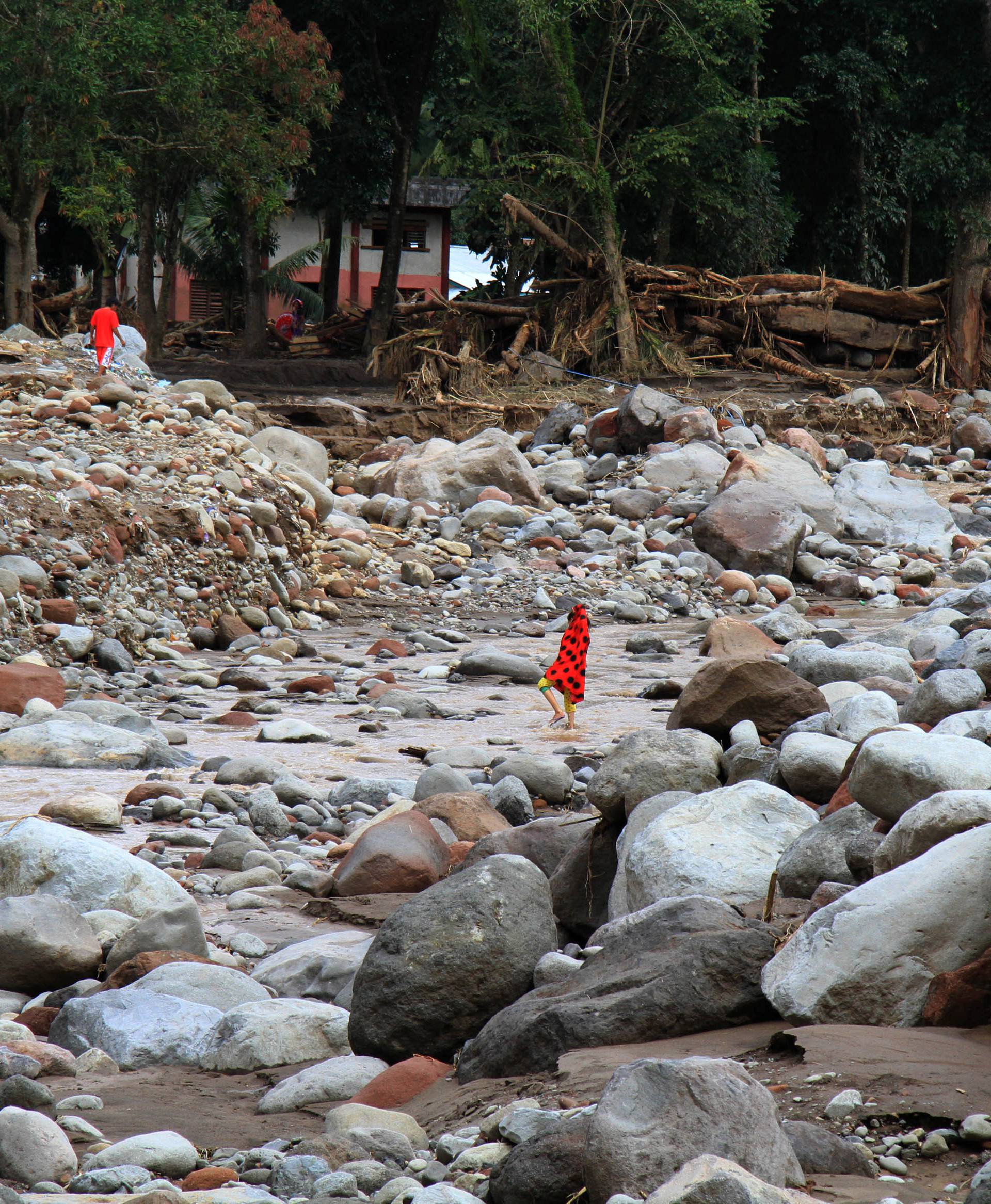 A view of boulders swept by flashfloods in a village in Salvador, Lanao del Norte