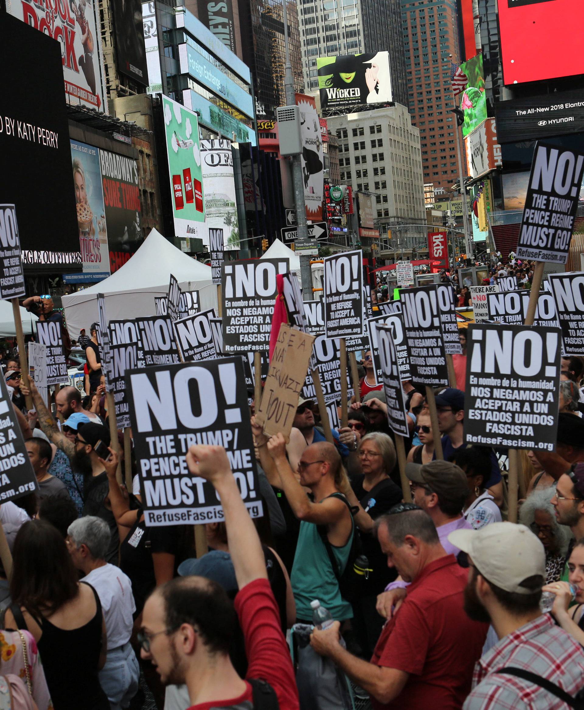 Protesters chant slogans against white nationalism in Times Square in New York City