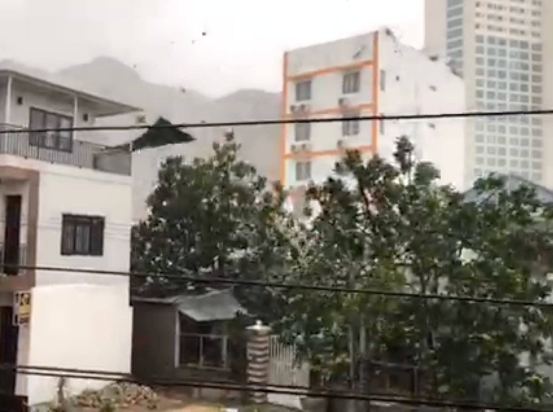 An object is blown by strong winds during a storm in Nha Trang, as Typhoon Damrey descends on southern Vietnam