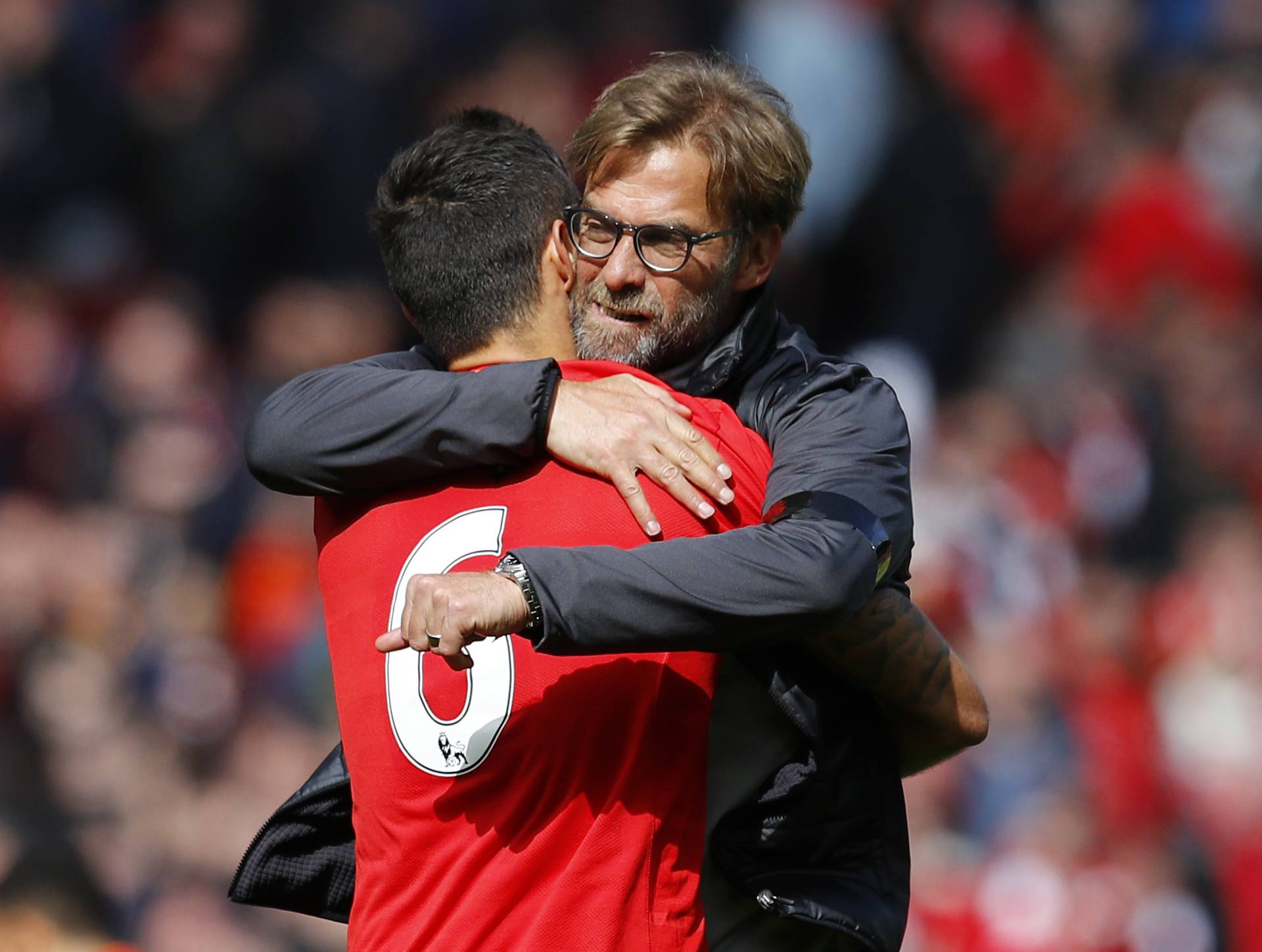 Liverpool manager Juergen Klopp celebrates with Dejan Lovren after the final whistle