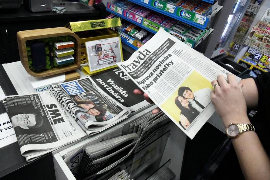 Front pages of Slovak newspapers are seen with headlines about and portraits of murdered Slovak investigative journalist Jan Kuciak and his girlfriend Martina Kusnirova, in a shop in Trnava