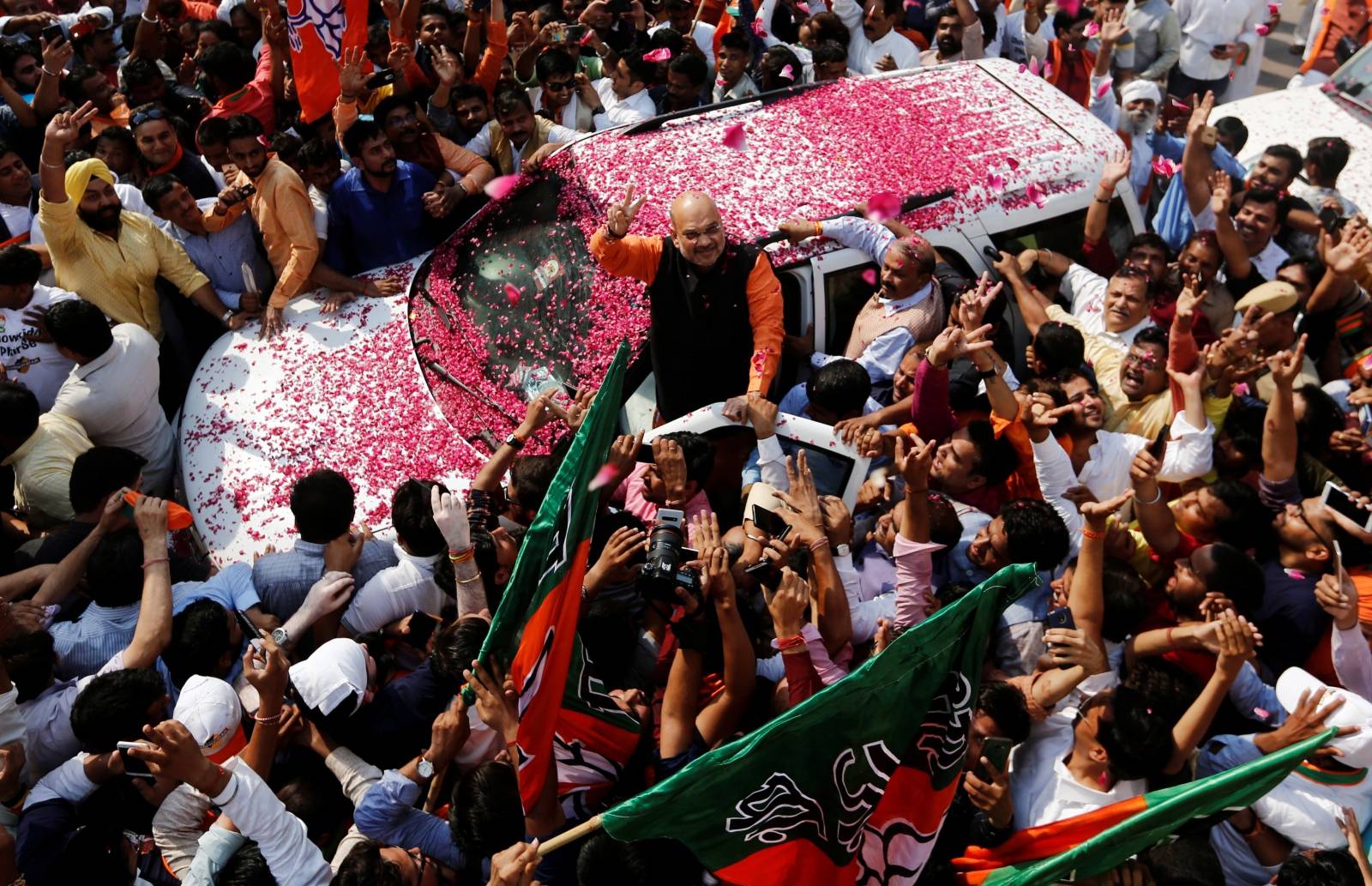 BJP President Amit Shah arrives at the party headquarters after learning the initial election results, in New Delhi