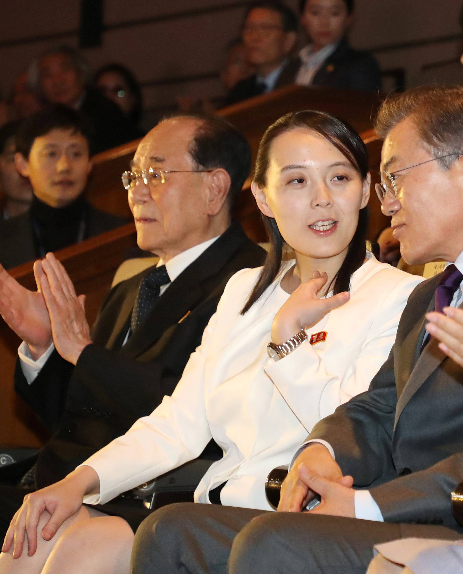 South Korean President Moon Jae-in talks with Kim Yo Jong, the sister of North Korea's leader Kim Jong Un, while watching North Korea's Samjiyon Orchestra's performance in Seoul