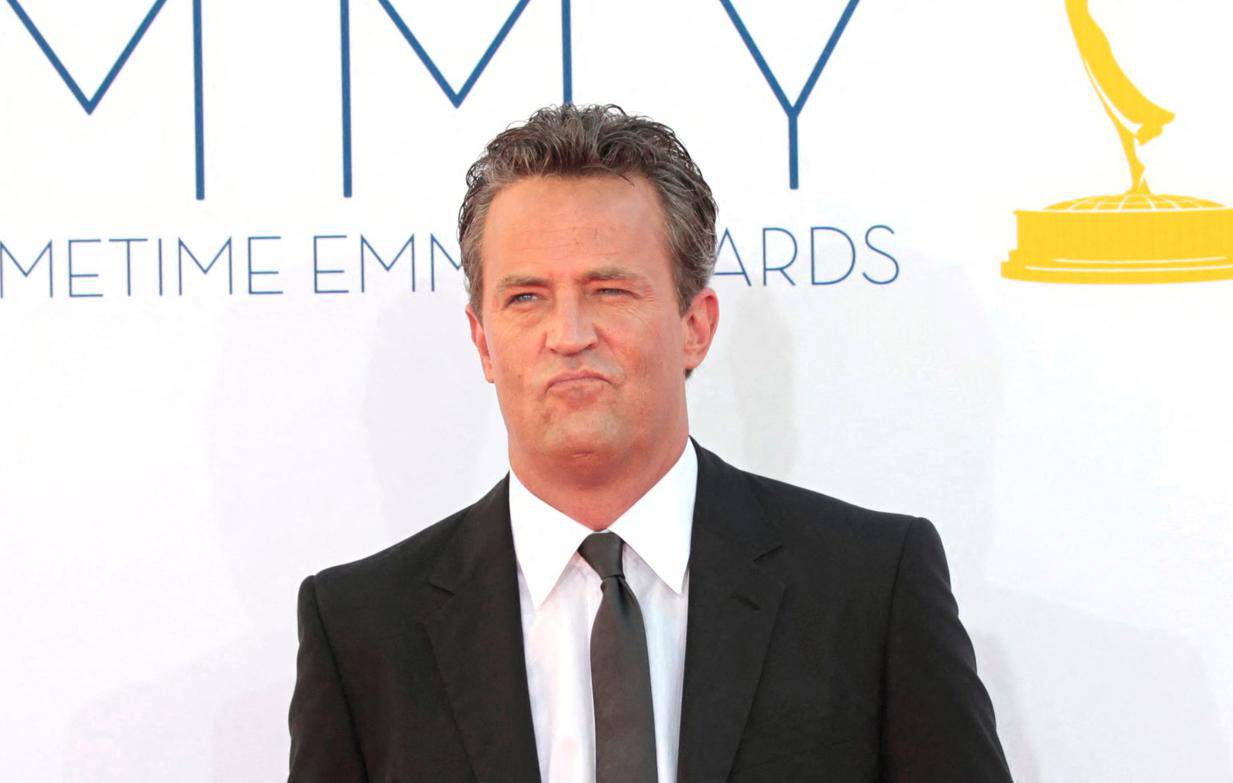 FILE PHOTO: Actor Matthew Perry arrives at the 64th Primetime Emmy Awards in Los Angeles