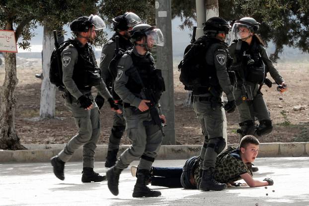 Israeli police clash with Palestinians at the compound that houses Al-Aqsa Mosque in Jerusalem