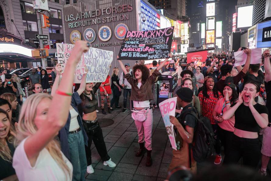 Activists hold a protest and rally in opposition to U.S. Supreme Court nominee Brett Kavanaugh near Times Square in New York