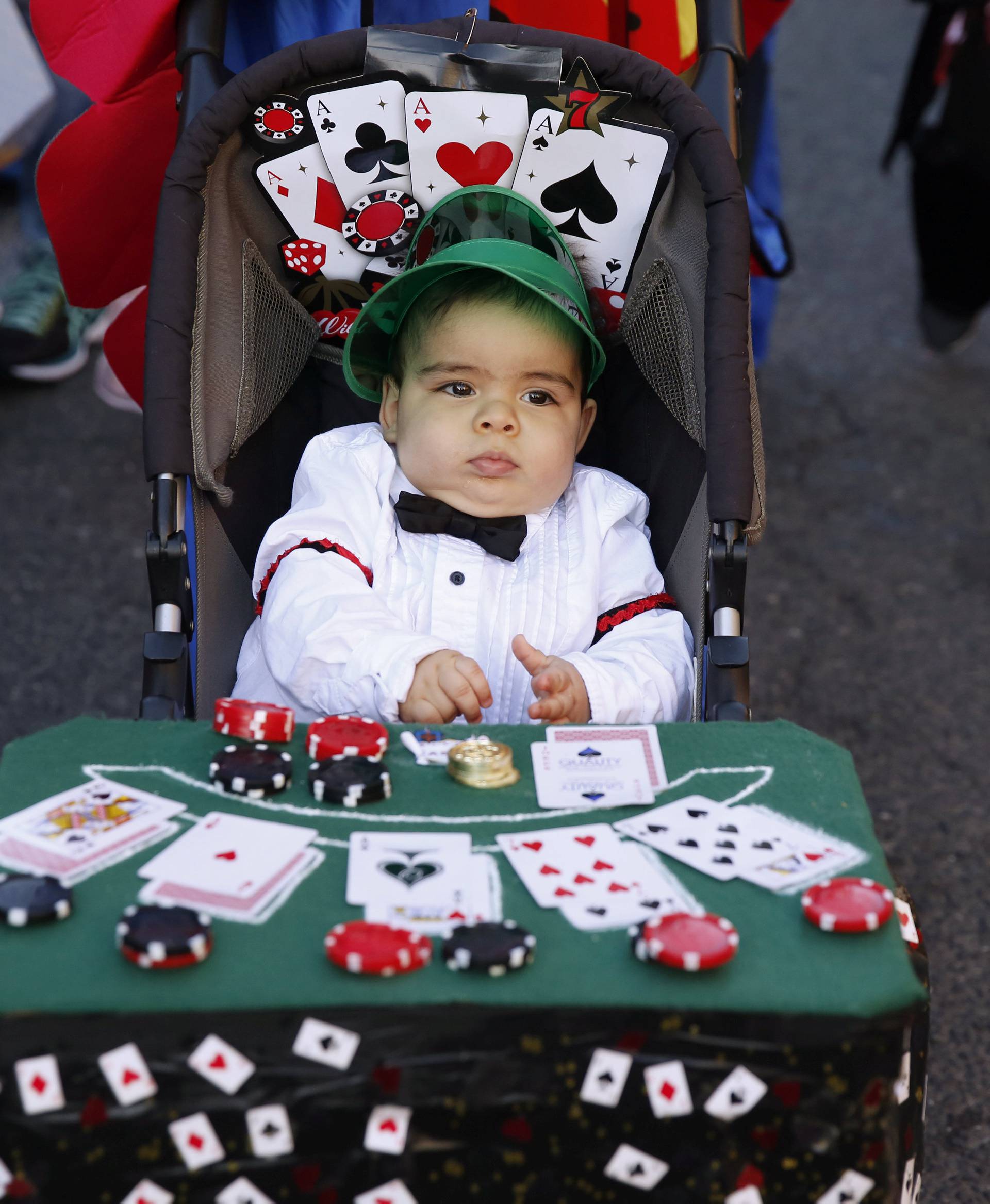 A young child takes part in the Hoboken Ragamuffin Parade to celebrate Halloween in Hoboken, New Jersey 