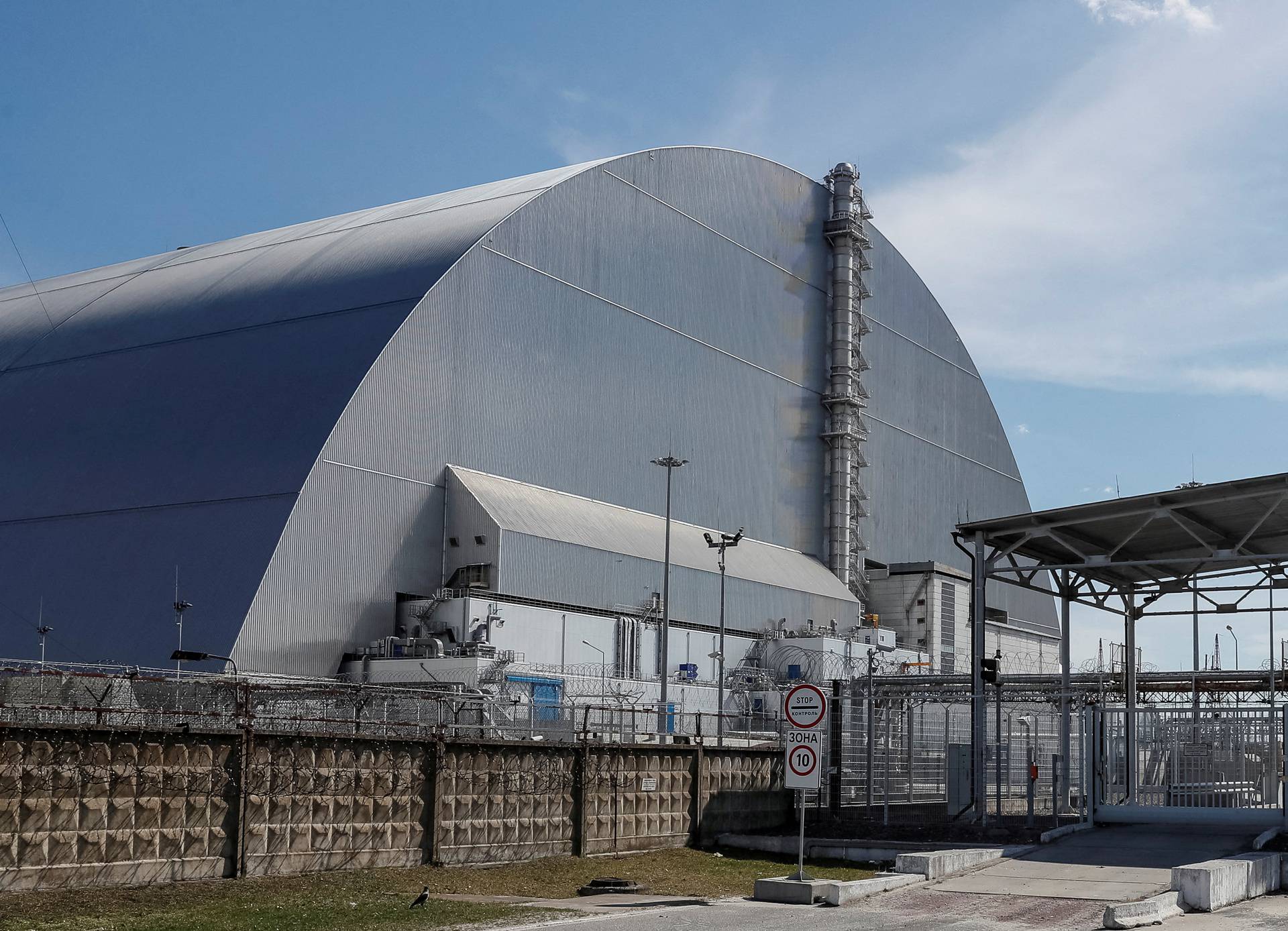 General view of the New Safe Confinement structure over the old sarcophagus covering the damaged fourth reactor at the Chernobyl Nuclear Power Plant, in Chernobyl