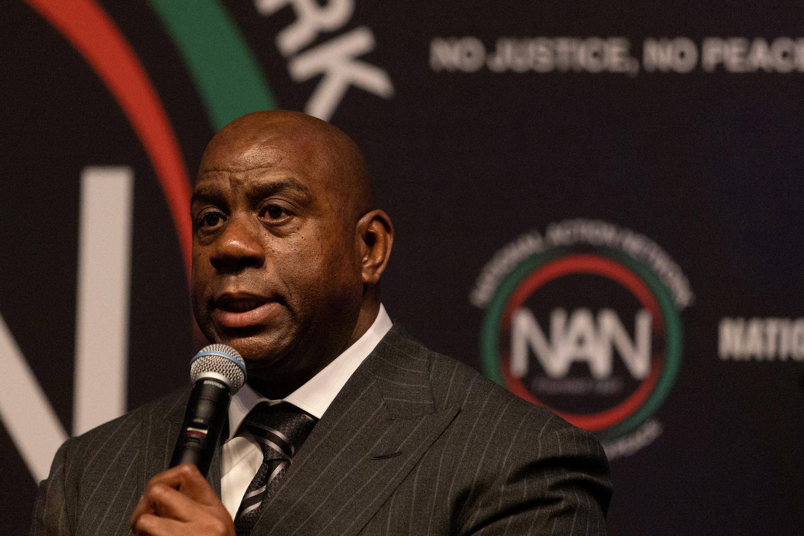 Former NBA basketball player Earvin Magic Johnson speaks during the National Action Network National Convention in New York