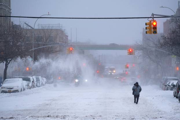 Snow falls during a Nor